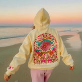 Women's floral letter embroidered hoodie with a loose fit.